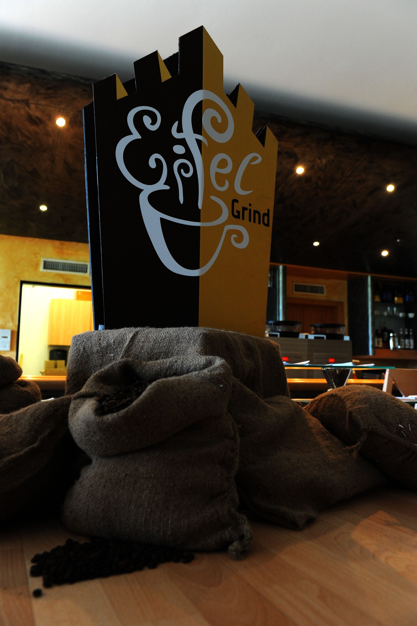 SPANGDAHLEM AIR BASE, Germany -- Eifel Grind, a European style café, opens 11 a.m. July 17 in Club Eifel here.  Located in what was once the officer’s section of Club Eifel, the café is designed for a jazz-like atmosphere and offers coffee, indoor and outdoor seating, free wireless internet and live entertainment Friday and Saturday nights. (U.S. Air Force photo by Airman 1st Class Gustavo Castillo/Realesed)  