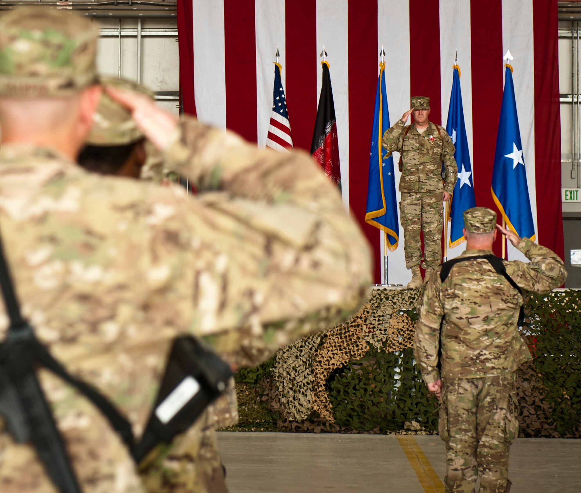Brig. Gen. Thomas Deale, outgoing 455th Air Expeditionary Wing commander receives his final salute from the wing during his change of command ceremony at Bagram Airfield, Afghanistan, July 12, 2012. Maj. Gen. H. D. Polumbo, 9th Air Expeditionary Task Force-Afghanistan commander, presided over the ceremony in which Brig. Gen. Thomas Deale relinquished command and Brig. Gen. Joseph Guastella assumed command. (U.S. Air Force Photo/Capt. Raymond Geoffroy)