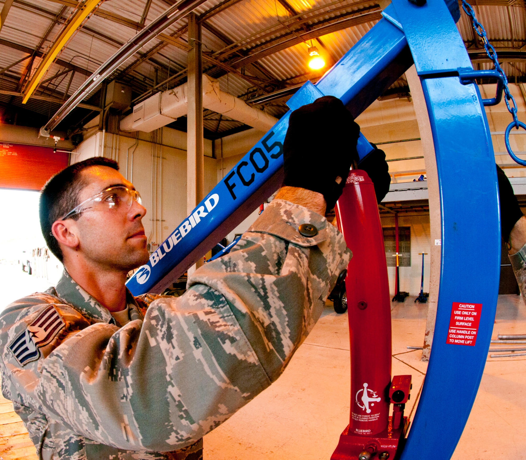 Staff Sgt. Mitch Corbin inspects aerospace grounds equipment at the 147th Reconnaissance Wing, Ellington Field Joint Reserve Base, Houston, Texas. Corbin was recognized for his lifesaving efforts when he pulled a Houston-area woman to safety following a fiery crash.  (photo by Master Sergeant Dale Hanson)
