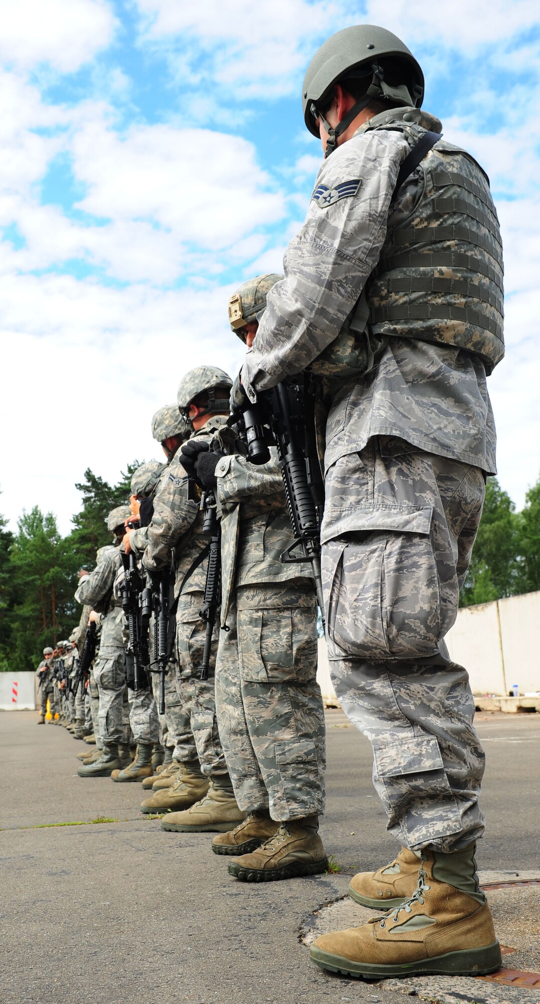 Members of the 86th Security Forces Squadron form a line before an active shooter exercise on Ramstein Air Base, Germany, July 10, 2012. The 86th SFS periodically holds training exercises to keep defenders proficient in security measures. (U.S. Air Force photo by Airman 1st Class Kendra Alba)