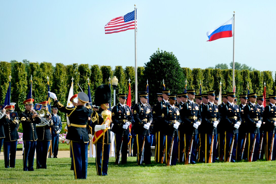 A U.S. military honor guard prepares for a full honor cordon to welcome Russian Army Gen. Nikolay Y. Makarov, chief of the Russian general staff and first deputy defense minister general, to the Pentagon, July 12, 2012. 