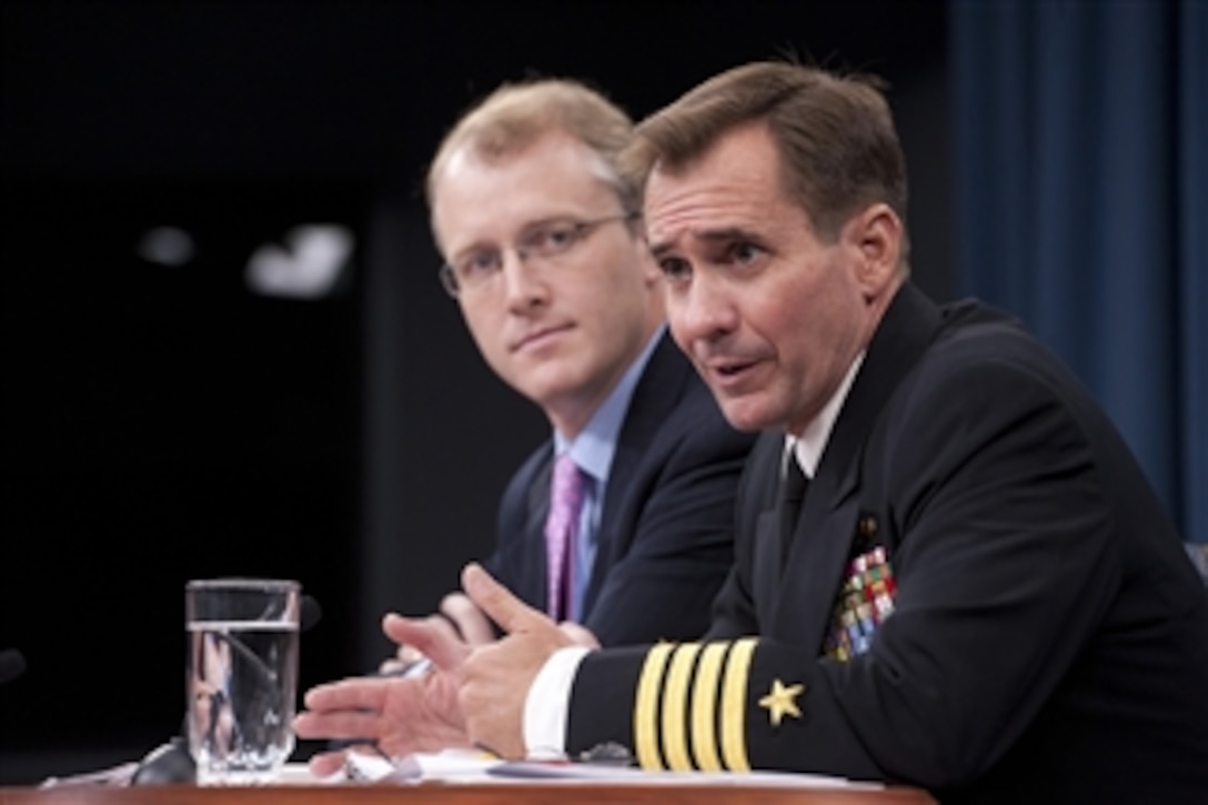 Deputy Secretary of Defense for Media Operations Capt. John Kirby answers a reporter's question during a Pentagon press conference with Acting Assistant Secretary of Defense for Public Affairs George Little on July 12, 2012.  
