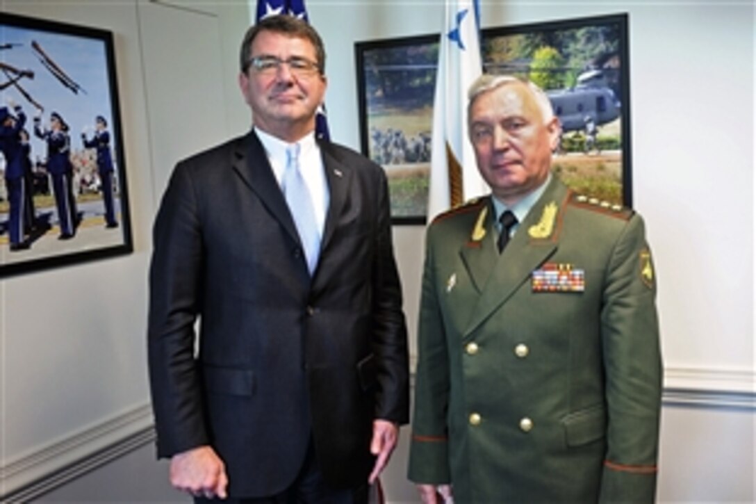 Deputy Defense Secretary Ashton B. Carter welcomes Russian Army Gen. Nikolay Y. Makarov, chief of the Russian general staff and first deputy defense minister general, to the Pentagon, July 12, 2012. The two held meetings to discuss areas of mutual defense interest.