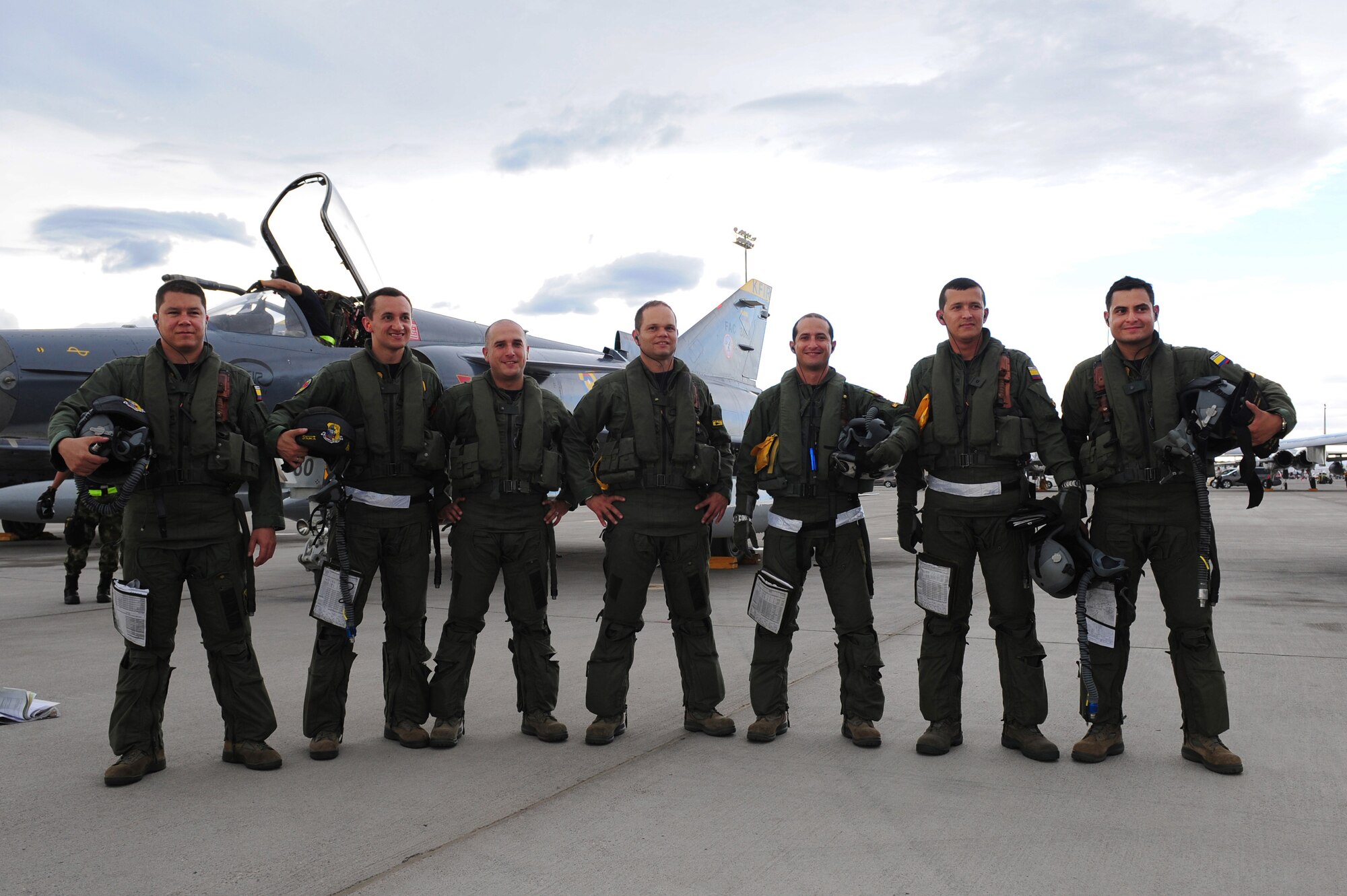 Colombian Air Force pilots participating in Red Flag 12-4 pose for a group photo July 13, 2012, after arriving at Nellis Air Force Base, Nev. Red Flag is a realistic combat training exercise involving the air forces of the United States and its allies. (U.S. Air Force photo by Staff Sgt. William P. Coleman)