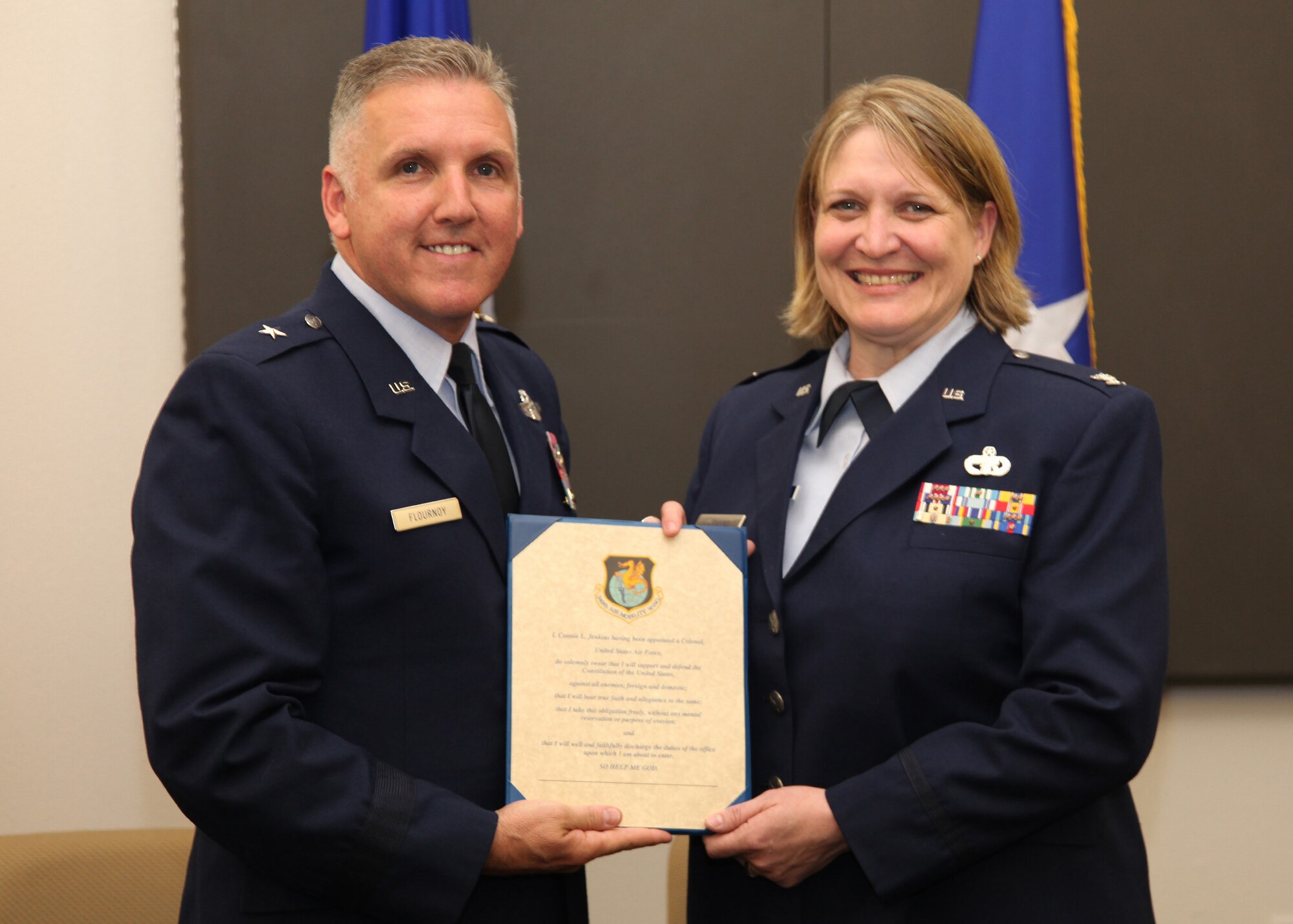 TRAVIS AIR FORCE BASE, Calilf. -- 349th Air Mobility Wing as Lt. Col. Connie Jenkins pinned on her eagles in June. (U.S. Air Force photos/Lt. Col. Robert Couse-Baker)