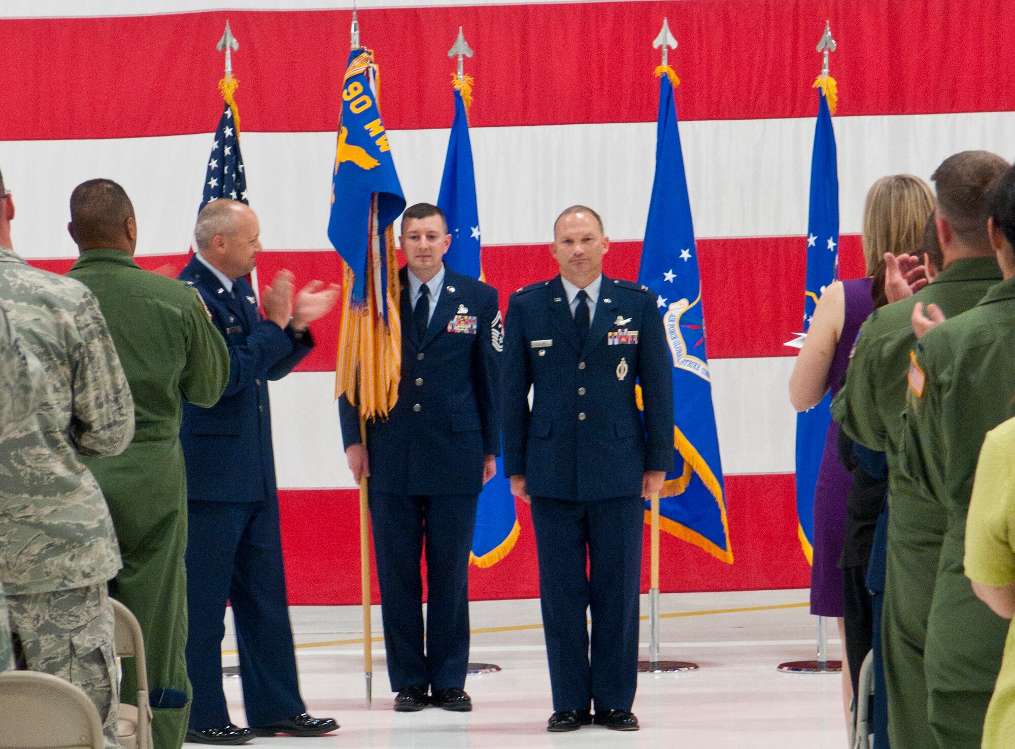 Col. Donald Holloway, 90th Operations Group commander, gives a speech after he officially became the 90th OG commander during an assumption-of-command ceremony July 6 in building 1250 at F. E. Warren Air Force Base, Wyo. (U.S. Air Force photo by Airman 1st Class Jason Wiese)