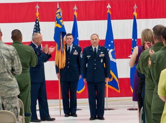 Col. Donald Holloway, 90th Operations Group commander, gives a speech after he officially became the 90th OG commander during an assumption-of-command ceremony July 6 in building 1250 at F. E. Warren Air Force Base, Wyo. (U.S. Air Force photo by Airman 1st Class Jason Wiese)