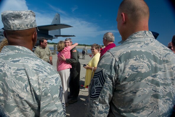 Air Force Chief of Staff Gen. Norton Schwartz celebrates with friends after his "hose down," July 12, 2012, at Hurlburt Field, Fla., following his last flight as an active-duty officer on an MC-130E Combat Talon I. The MC-130E Combat Talon I crew conducted a local training sortie during the mission. It also served as Schwartz's "fini flight" in the Air Force. (U.S. Air Force photo / Airman 1st Class Christopher Williams) (Released)