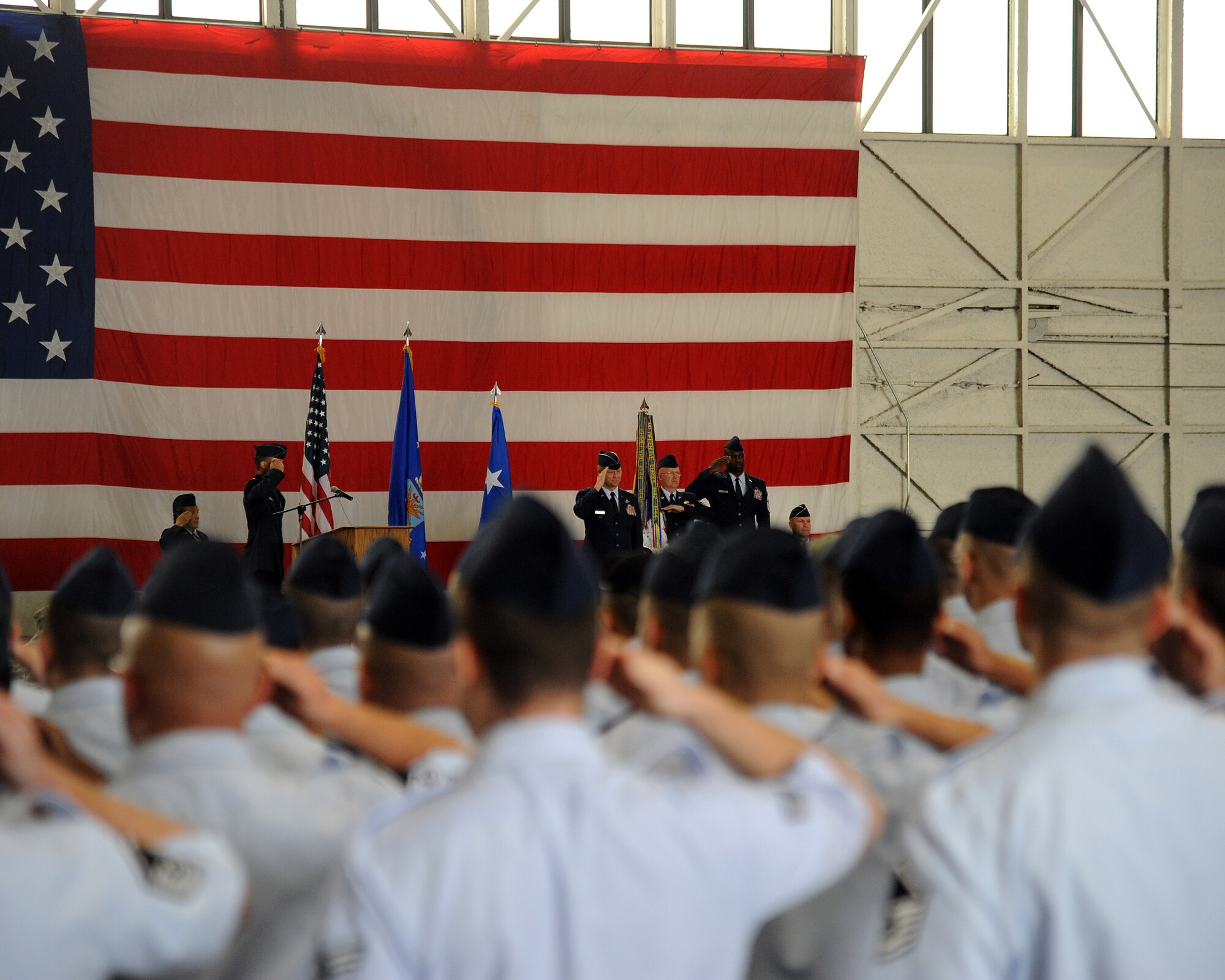 Brig. Gen. Mark Kelly receives his first salute from the Airmen of the 354th Fighter Wing following the 354th FW change of command ceremony July 13, 2012, Eielson Air Force Base, Alaska. The first salute is symbolic of the wing's acknowledgement of it's new commander. Kelly arrives from Joint Base Pearl Harbor-Hickam, where he served as Chief of Staff, Pacific Air Forces. (U.S. Air Force photo by Senior Airman Willard E. Grande II)