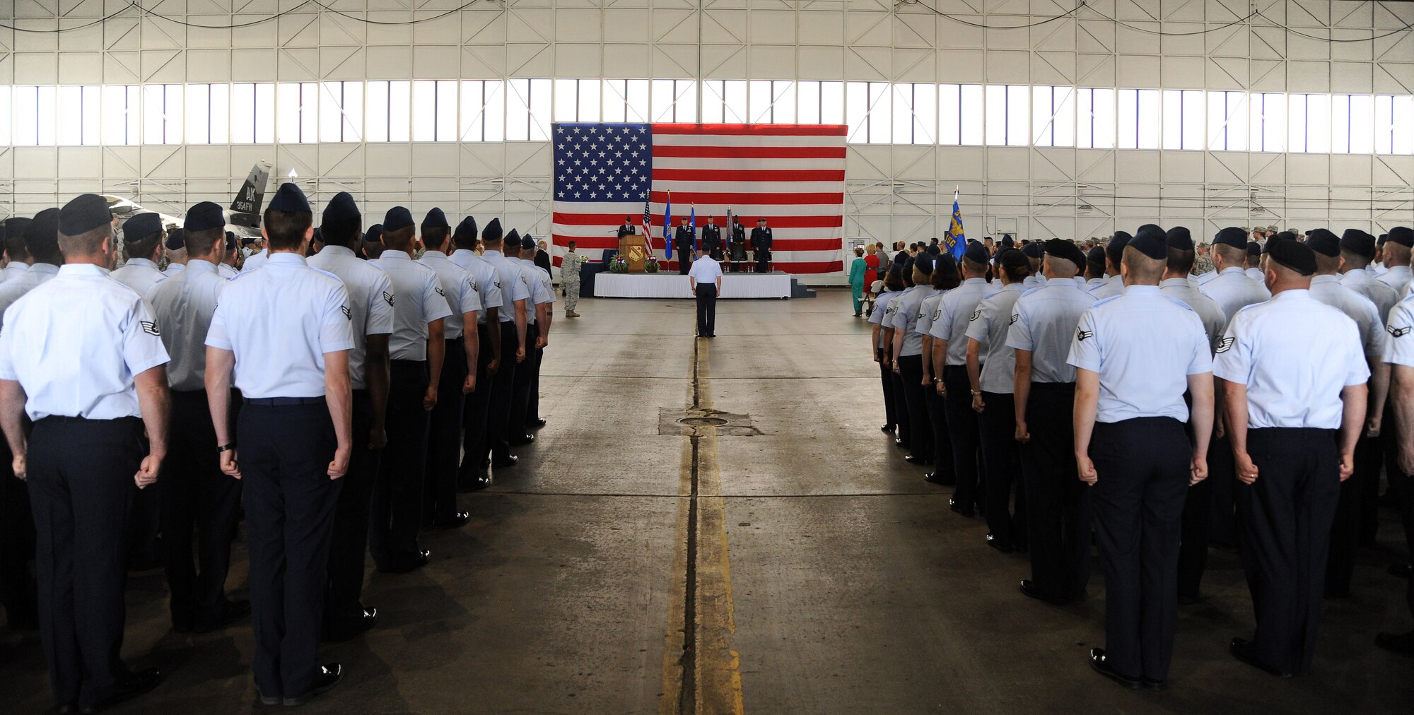 Brig. Gen. James Post III relinquishes command of the 354th Fighter Wing to Brig. Gen. Mark Kelly during a change of command ceremony July 13, 2012, Eielson Air Force Base, Alaska. The ceremony was officiated by Lt. Gen. Stephen Hoog, Alaskan Command and 11th Air Force commander, and was witnessed by the Airmen of the 354th FW. (U.S. Air Force photo by Senior Airman Willard E. Grande II)