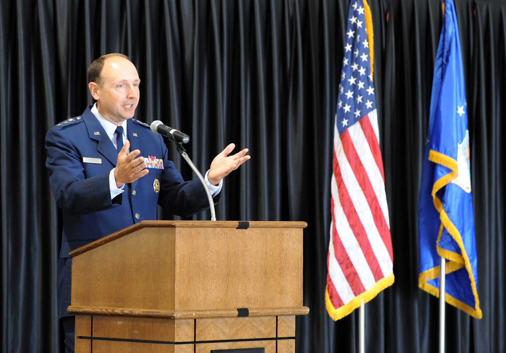 Lt. Gen. Bruce Litchfield, commander of the Air Force Sustainment Center at Tinker Air Force Base, Okla., addresses more than 400 dignitaries and base people during a ceremony in which the Ogden Air Logistics Center was re-designated the complex at Hill Air Force Base July 12. The complex also became part of the Air Force Sustainment Center. (U.S. Air Force photo/Alex Lloyd)