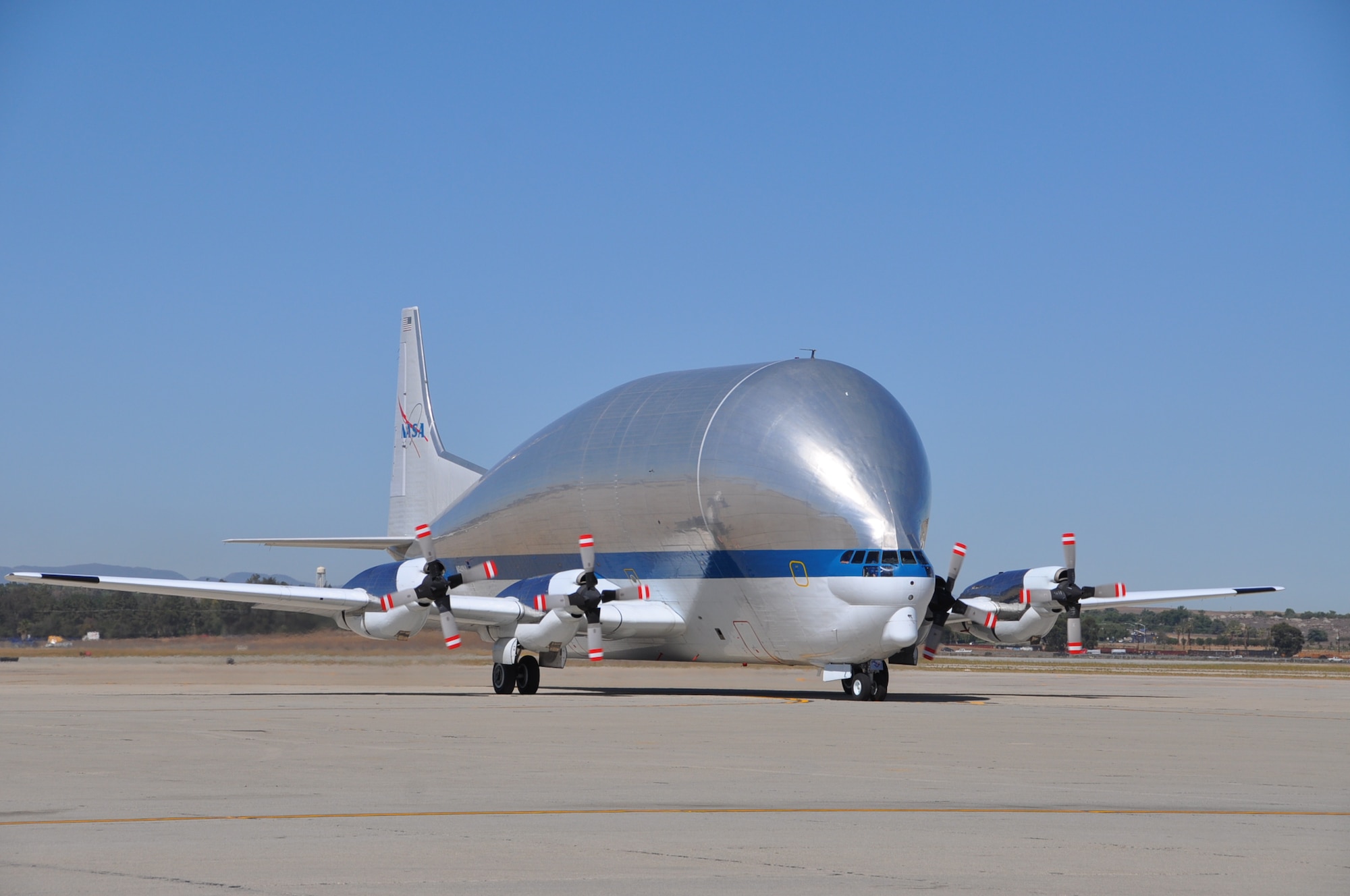 The Super Guppy landed at March ARB for a gas-and-go while en route to Travis Air Force Base, Calif, on June 28. The crew was transporting parts of the space shuttle for NASA which will later be reassembled and placed on display at the Museum of Flight in Seattle, Wash. (U.S. Air Force photo by Linda Welz) 