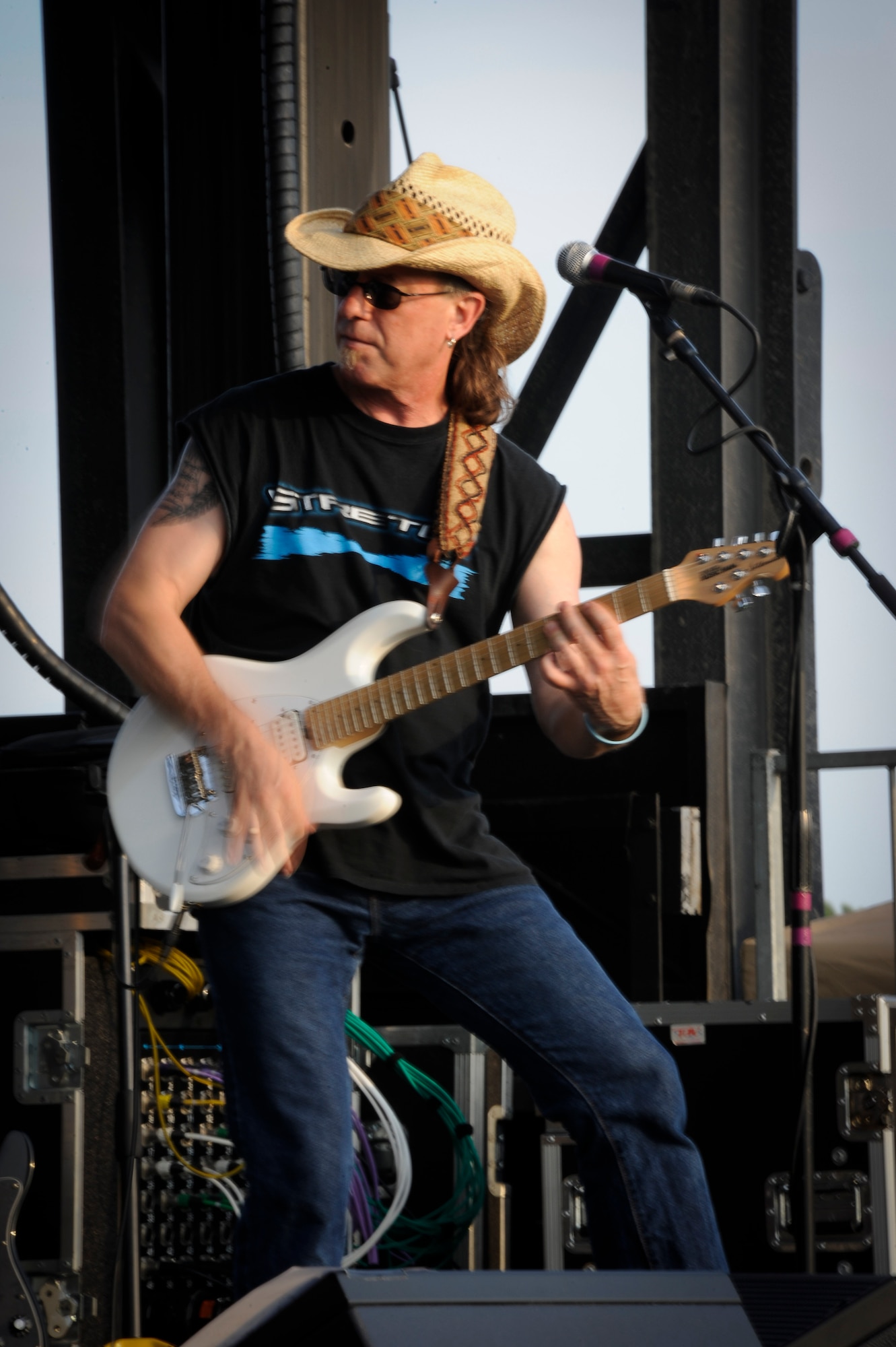 Glenn Alexander of the band, Southside Johnny and the Asbury Jukes, jams on his guitar during their live performance on the main stage at Doughboy Field July 4 here. They were the only performers at this year’s event, playing some of their own hits. (U.S. Air Force photo by Airman 1st Class Ryan Throneberry/Released)
