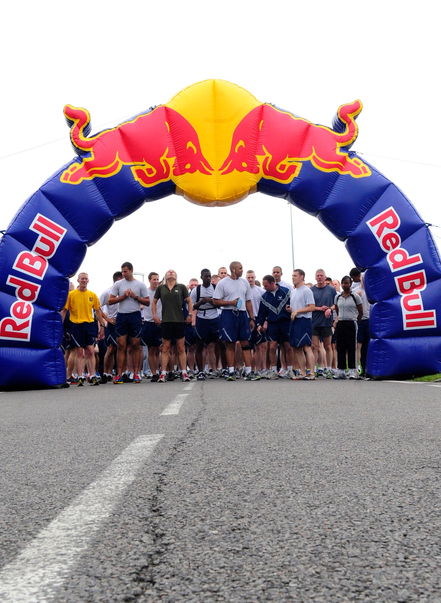 RAF MILDENHALL, England – Participants of the July Team Mildenhall Fun Run prepare to begin the friendly race July 13, 2012. The five-kilometer run has become a monthly tradition here, allowing military members from throughout the wing to gather as a team and improve their fitness among friends and coworkers. (U.S. Air Force photo/Senior Airman Ethan Morgan)