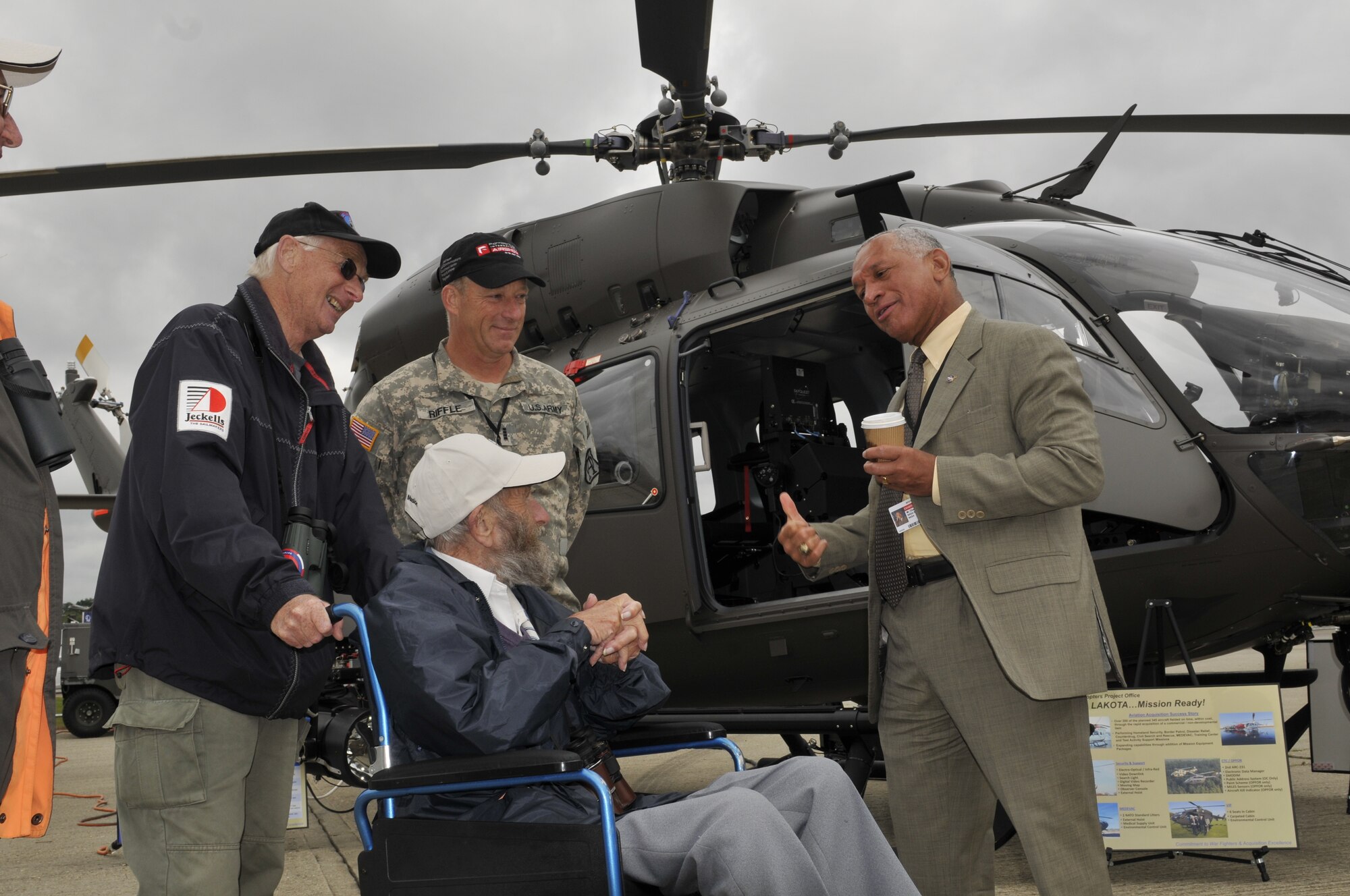 FARNBOROUGH, England - Charles Bolden, National Aeronautics and Space Administration administrator, chats with a show guest in front of the U.S. Army's newest helicopter the UH-72A Lakota, July 10, 2012, during the Farnborough International Air Show in Farnborough, England. The Lakota is a state-of-the-art aircraft with twin engine reliability, a 21st century navigation/communication system and a proven record of commercial aviation service. Approximately 90 aircrew and support personnel from bases in Europe and the United States are participating in the air show. Participation in this premier event demonstrates that U.S. defense industry offers state-of-the-art capabilities vital for the support and protection of our allies' and partners' national-security interests. (U.S. Air Force photo by Tech. Sgt. Lee A. Osberry Jr.)