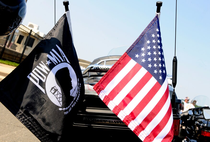 U.S. and POW/MIA flags were prominently displayed on the motorcycles of service members, veterans and civilians participating in the annual Memorial Day Rolling Thunder motorcycle ride from the Pentagon to the Vietnam Veterans Memorial. The 25th anniversary event drew more than 900,000 spectators and riders.  (U.S. Air Force photo by Scott Ash)