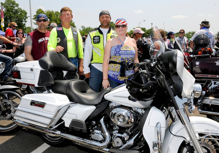 Terry Yonkers, Assistant Secretary of the Air Force for Installations, Environment and Logistics, second from left, was among participants of the 2012 Memorial Day Rolling Thunder motorcycle ride from the Pentagon to the Vietnam Veterans Memorial. Shown with Yonkers are, left to right: Christopher Orbits, president of Chapter 20, Green Knights Military Motorcycle Club, and club members Verdis and Brenda Jones. (U.S. Air Force photo by Scott Ash)  