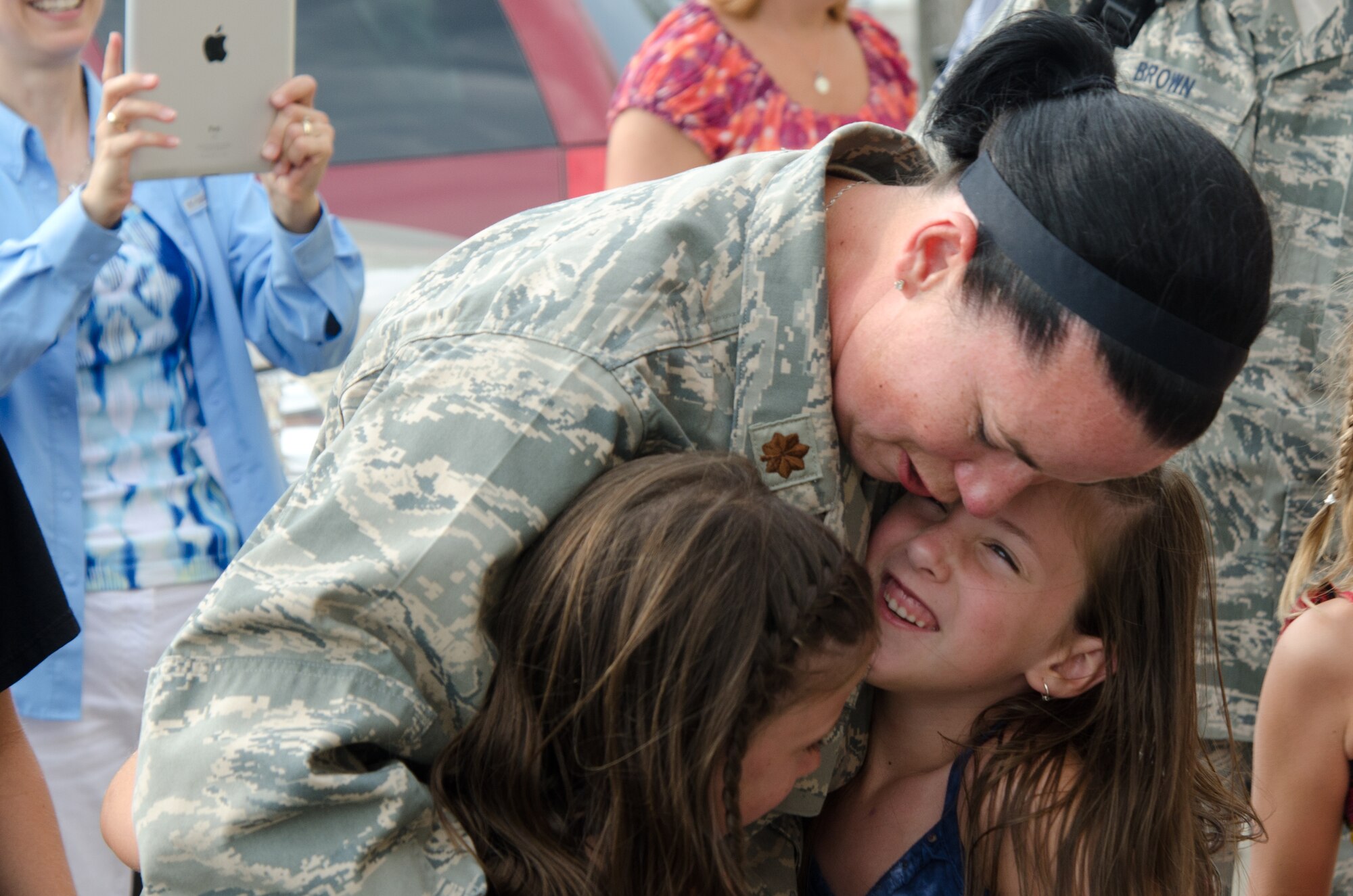 Members of the 139th Civil Engineering Squadron return home from Guantanamo to the 139th Airlift Wing, St. Joseph, Mo., Thursday July 12, 2012. (Air National Guard photo by Senior Airman Kelsey Stuart/Released)