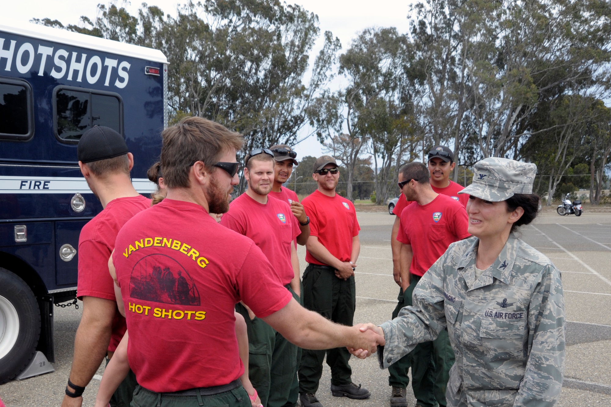 VANDENBERG AIR FORCE BASE, Calif. – Col. Nina Armagno, 30th Space Wing commander, greets returning Vandenberg Hot Shots crew members here, Thursday, July 12, 2012. The Hot Shots were fighting wildfires in Colorado and Wyoming, which burned 29,168 acres total and destroyed nearly 350 houses in Colorado.
(U.S. Air Force photo/Jerry E. Clemens Jr.) 