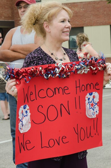 Members of the 139th Civil Engineering Squadron return home from Guantanamo to the 139th Airlift Wing, St. Joseph, Mo., Thursday July 12, 2012. (Air National Guard photo by Senior Airman Kelsey Stuart/Released)