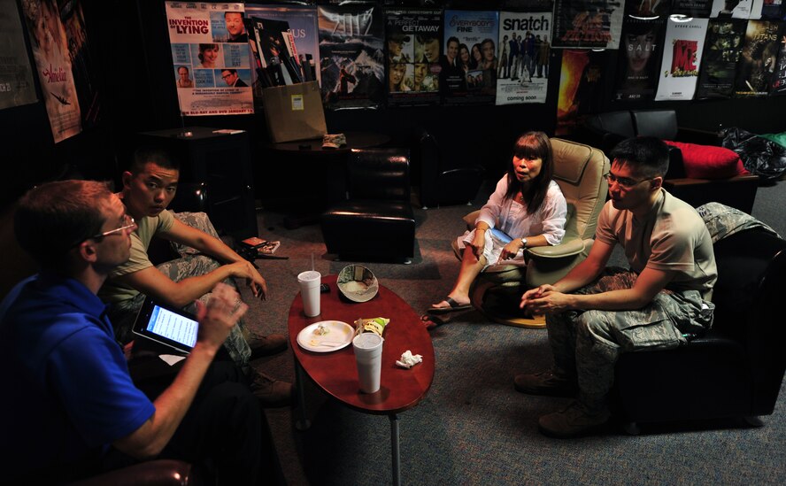 An instructor teaches a group of participants about proper Cantonese pronunciations during a Lunch Lingo meeting at the Landing Zone at Hurlburt Field, Fla., July 12, 2012. Lunch Lingo is a free daily lunch-time language seminar for Airmen at any skill level. (U.S. Air Force photo/Airman 1st Class Nigel Sandridge) (Released)