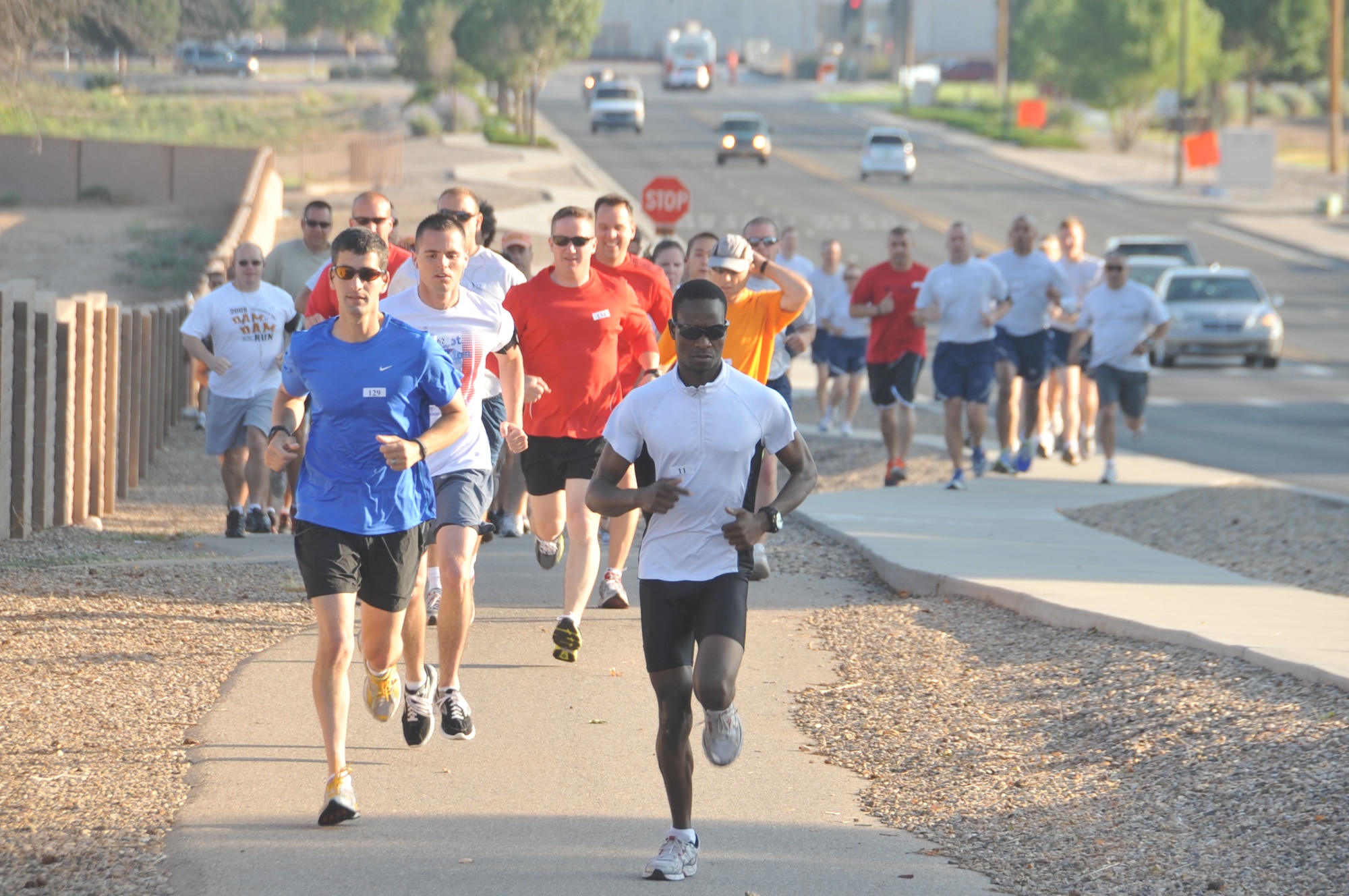KIRTLAND AFB, N.M. -- Members of Team Kirtland participated in the third annual Top 3 5k run Wednesday at Kirtland Air Force Base. Winners were Airman 1st Class Dominik Kosgel, men 24 and under; Jessica Ward, women 24 and under; Senior Airman Jed Morris, men 25 to 35; Tech. Sgt. Kristy Nelson, women 25 to 35; Col. Marcus Schulthess, men 36 and over; and Imelda Terrill, women 36 and over. Proceeds from the event will support the Senior NCO induction ceremony, E1 through E6 scholarships, and Airmen recognition programs. (Photo by Todd Berenger)