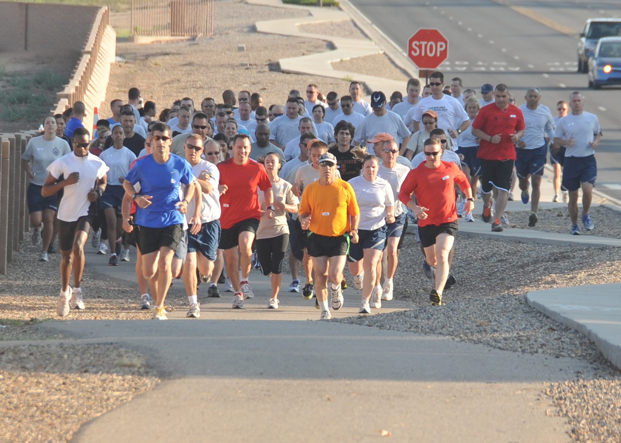 KIRTLAND AFB, N.M. -- Members of Team Kirtland participated in the third annual Top 3 5k run Wednesday at Kirtland Air Force Base. Winners were Airman 1st Class Dominik Kosgel, men 24 and under; Jessica Ward, women 24 and under; Senior Airman Jed Morris, men 25 to 35; Tech. Sgt. Kristy Nelson, women 25 to 35; Col. Marcus Schulthess, men 36 and over; and Imelda Terrill, women 36 and over. Proceeds from the event will support the Senior NCO induction ceremony, E1 through E6 scholarships, and Airmen recognition programs. (Photo by Todd Berenger)