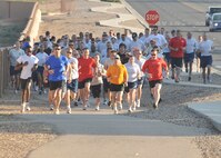 KIRTLAND AFB, N.M. -- Members of Team Kirtland participated in the third annual Top 3 5k run Wednesday at Kirtland Air Force Base. Winners were Airman 1st Class Dominik Kosgel, men 24 and under; Jessica Ward, women 24 and under; Senior Airman Jed Morris, men 25 to 35; Tech. Sgt. Kristy Nelson, women 25 to 35; Col. Marcus Schulthess, men 36 and over; and Imelda Terrill, women 36 and over. Proceeds from the event will support the Senior NCO induction ceremony, E1 through E6 scholarships, and Airmen recognition programs. (Photo by Todd Berenger)