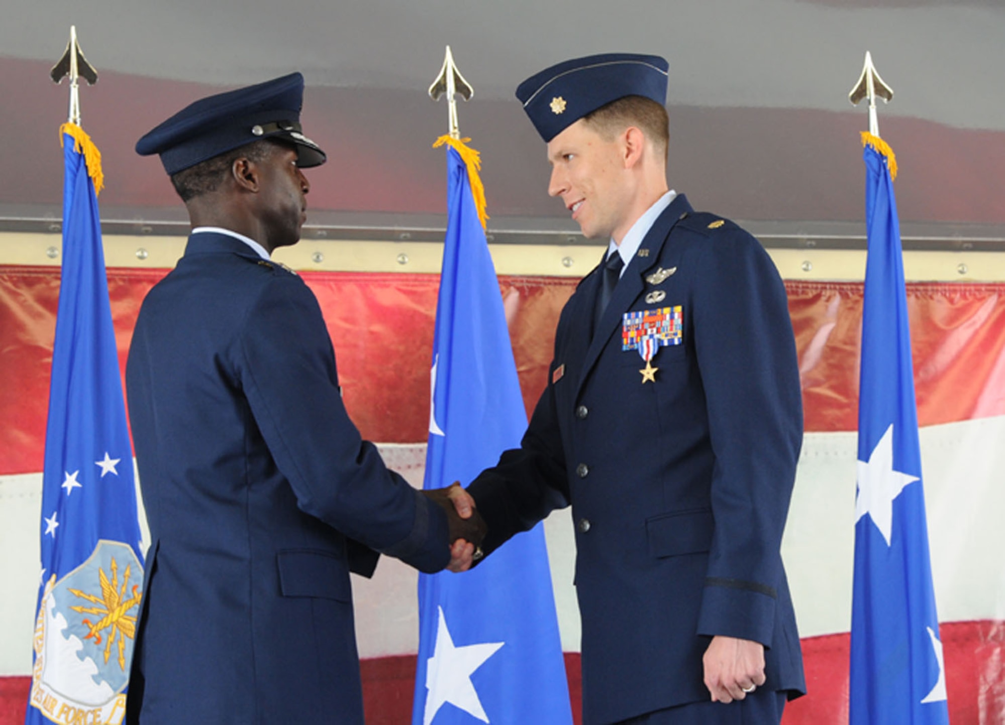 Maj. Philip Bryant, combat search and rescue pilot, was presented the
Silver Star medal at the 19th Air Force's inactivation ceremony Thursday at
Joint Base San Antonio-Randolph.  Gen. Edward A. Rice Jr., Air Education
Training Command commander, presented the third highest military decoration
to Bryant for his participation in a recovery mission of two U.S. Army
pilots who were downed in the Allasay Valley, an enemy controlled area east
of Bagram Airfield, Afghanistan on April 23, 2011.  (U.S. Air Force photo by Rich McFadden)