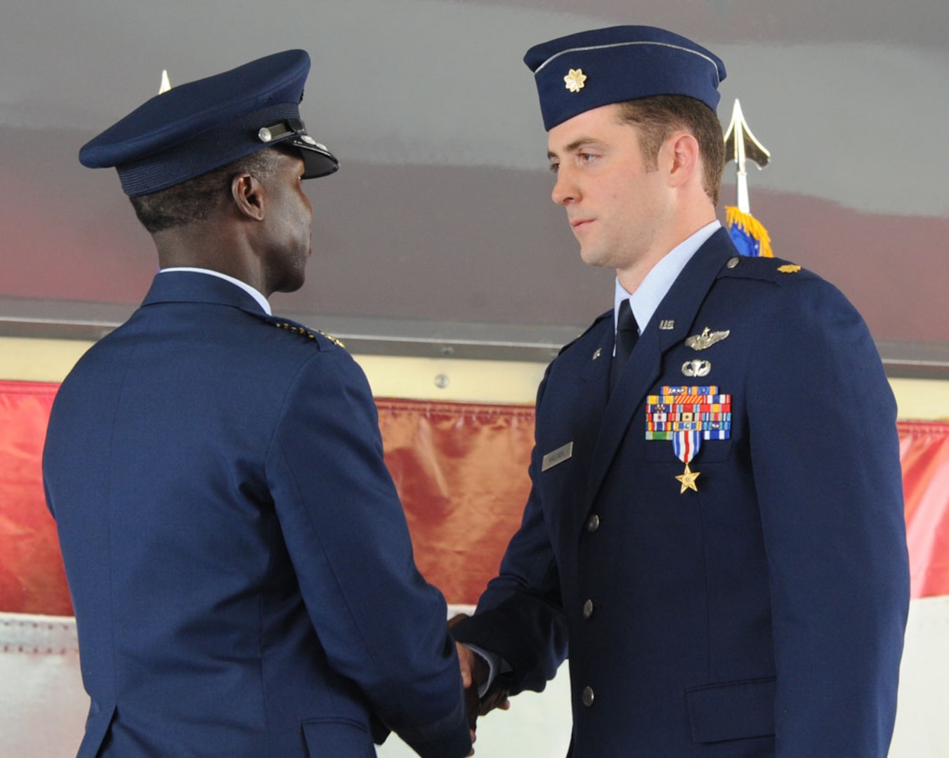 Maj. Joshua Hallada, combat search and rescue pilot, was presented the
Silver Star medal at the 19th Air Force's inactivation ceremony Thursday at
Joint Base San Antonio-Randolph.  Gen. Edward A. Rice Jr., Air Education
Training Command commander, presented the third highest military decoration
to Hallada for his participation in a recovery mission of two U.S. Army
pilots who were downed in the Allasay Valley, an enemy controlled area east
of Bagram Airfield, Afghanistan on April 23, 2011.  (U.S. Air Force photo by Rich McFadden)