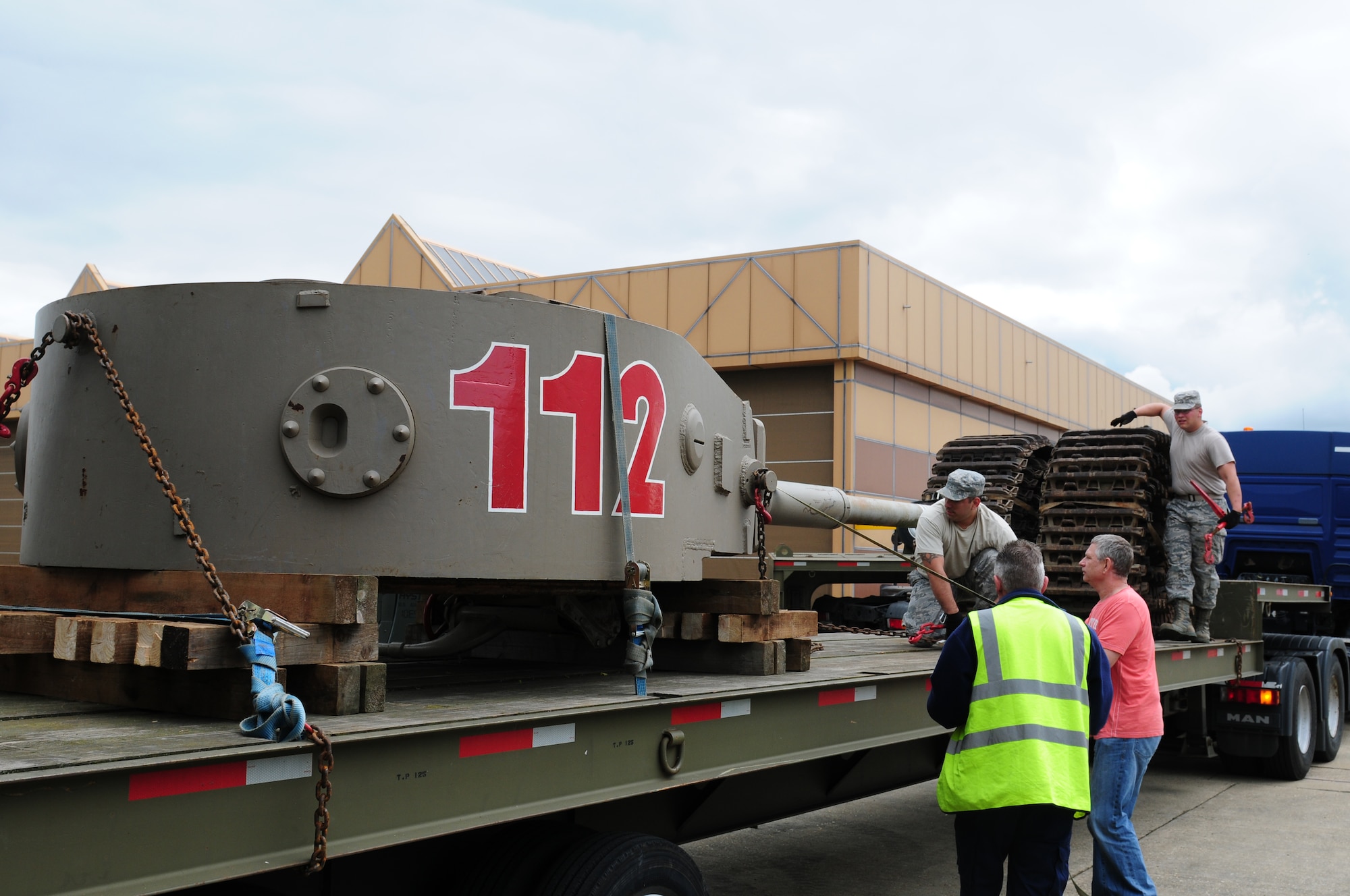 ROYAL AIR FORCE ALCONBURY, England – The turret of a Tiger 1, a World War II era German tank, is secured to be moved to RAF Lakenheath by members of the 48th Fighter Wing  July 9, 2012. The Tiger 1, one of six left in the world, will be shipped to the U.S. Army Armor and Cavalry Museum at Fort Benning, Ga., for repair and full restoration.  (U.S. Air Force photo by Airman 1st Class Cory D. Payne)