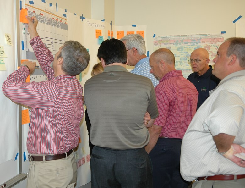 Approximately two dozen specialists gathered recently to map out a timeline for standing up the depot maintenance operations at Tinker AFB for the new Air Force tanker, the KC-46A; the group assembled in a room at the Rose State College Training Center. (Air Force photo by Mike W. Ray)