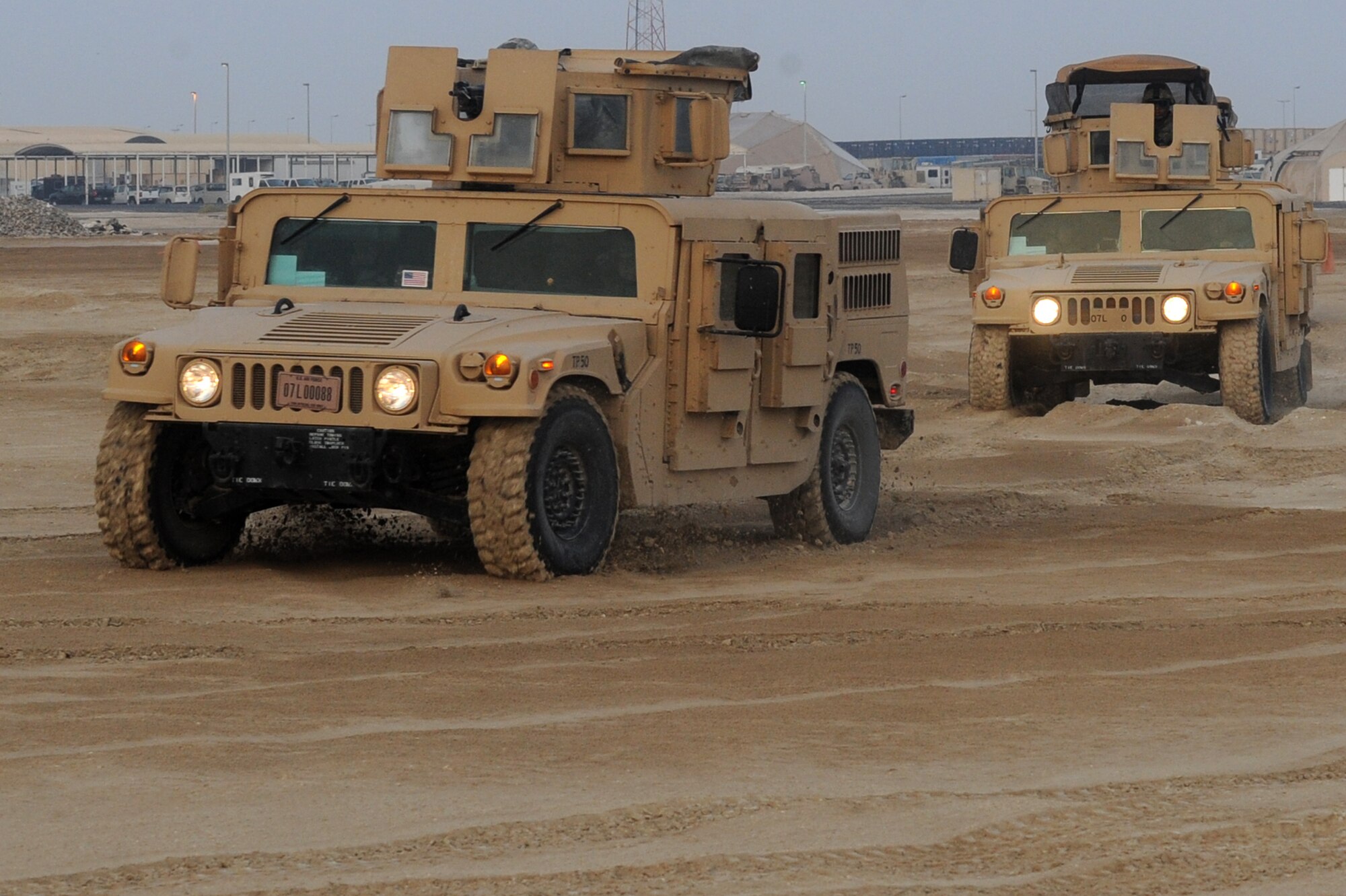 SOUTHWEST ASIA - The 380th Expeditionary Security Forces Squadron Quick Response Force responds to an intruder-on-base exercise July 12, 2012. The QRF responds to any hostile threat against the base in five minutes or less. (U.S. Air Force photo/Master Sgt. Scott MacKay)