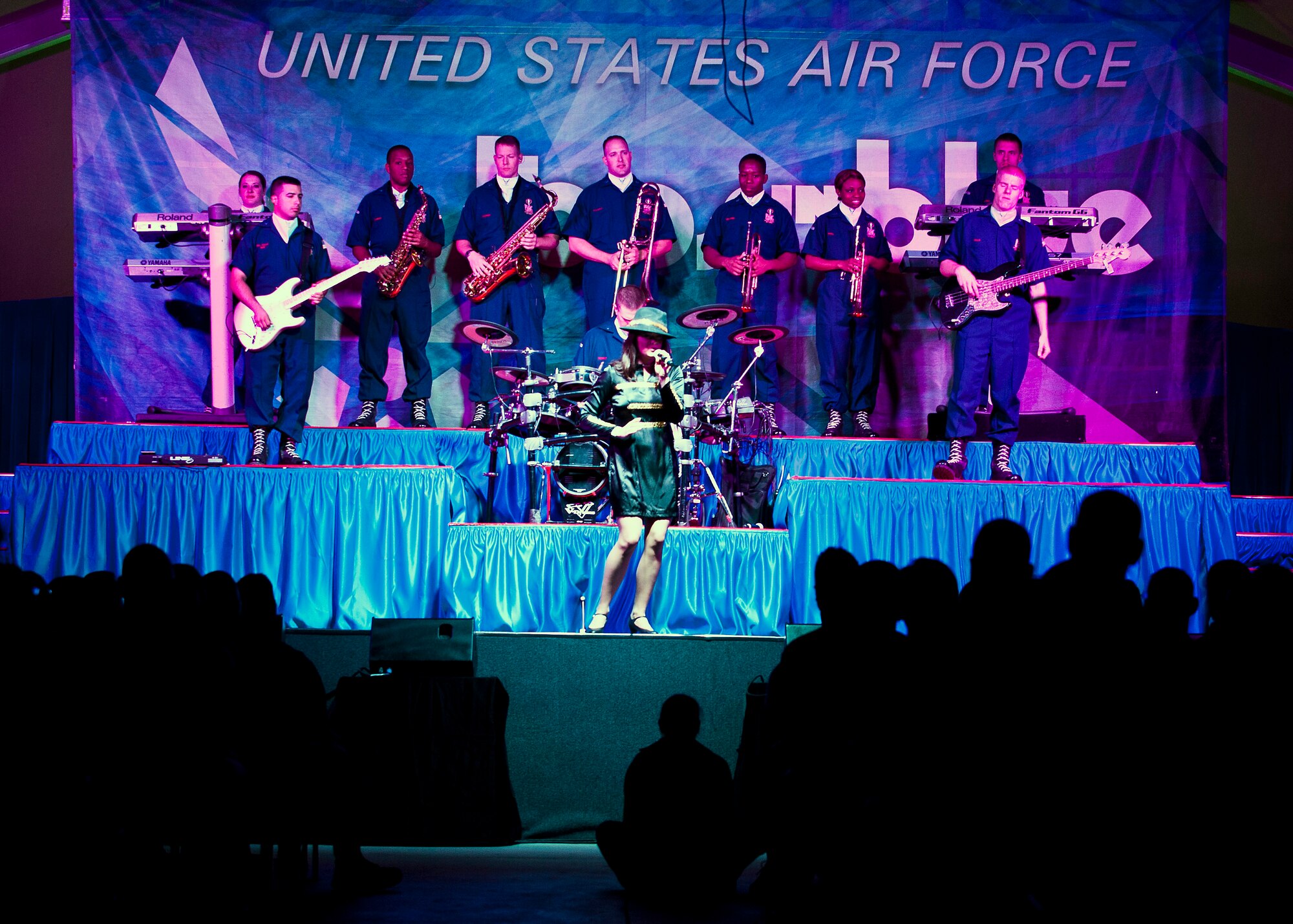 Tops in Blue members perform during the Tops in Blue 2012 World Tour at the Transit Center at Manas, Kyrgyzstan, July 12, 2012. This year's tour will take Tops in Blue throughout the United States and to more than 20 countries, with close to 130 performances in a 10-month period. (U.S. Air Force photo/Senior Airman Brett Clashman)
