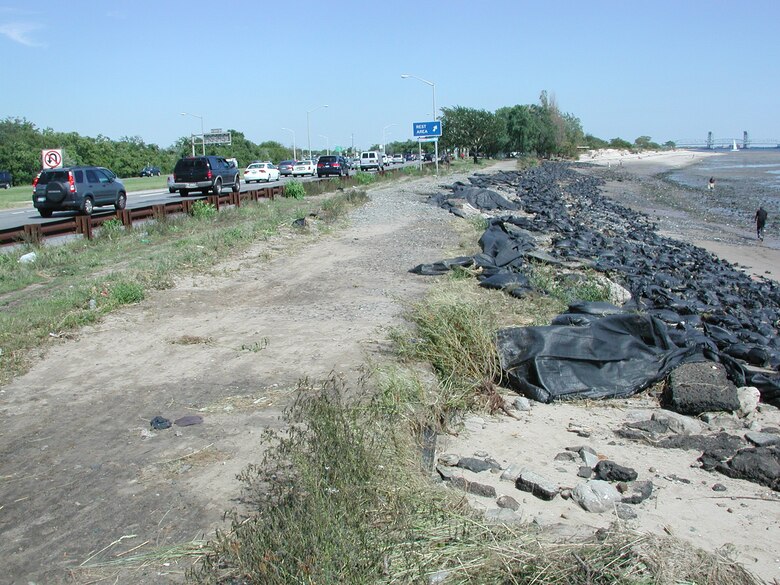 NEW YORK — This picture is of Plum Beach. This image was taken immediately after Hurricane Irene. It illustrates the proximity of the Belt Parkway, and the temporary sandbag structure placed by City of New York Parks and Recreation to limit erosion until a more suitable project is constructed.