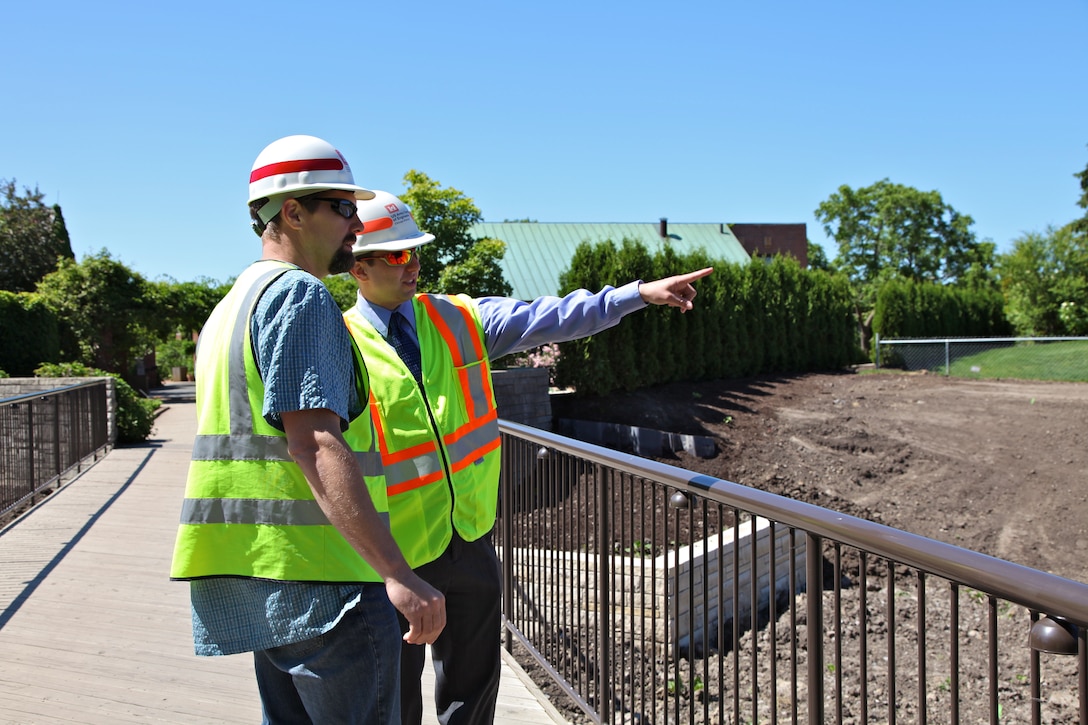 Chicago Botanic Garden Restoration Project Manager Jeff Zuercher and Construction Representative Dan Kein discuss plans to refill North Lake. The lake was drained in November 2011 in order to rejuvenate the shoreline with the addition of shallow water planting "shelves" as part of the U.S. Army Corps of Engineers' Ecosystem Restoration Program.