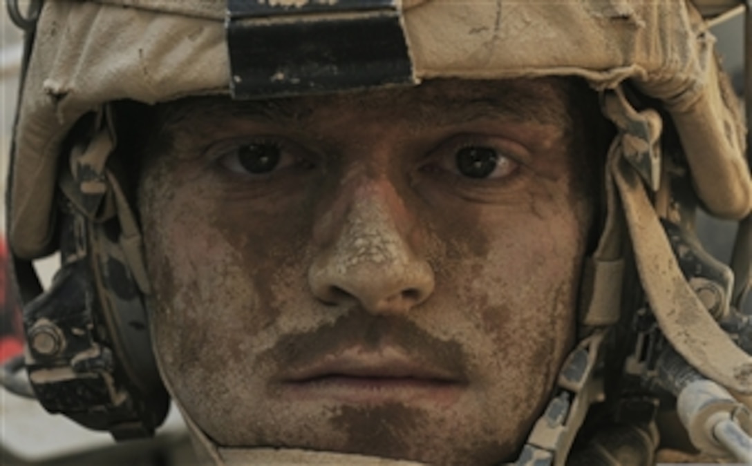 U.S. Army Sgt. Tim Martin's face shows the effects of the heat and the dust as he returns to Forward Operating Base Spin Boldak, Afghanistan, after participating in Operation Buffalo Thunder II, on July 2, 2012.  Martin is an infantryman with Headquarters and Headquarters Company of the 1st Battalion, 17th Infantry Regiment, 2nd Infantry Division.  