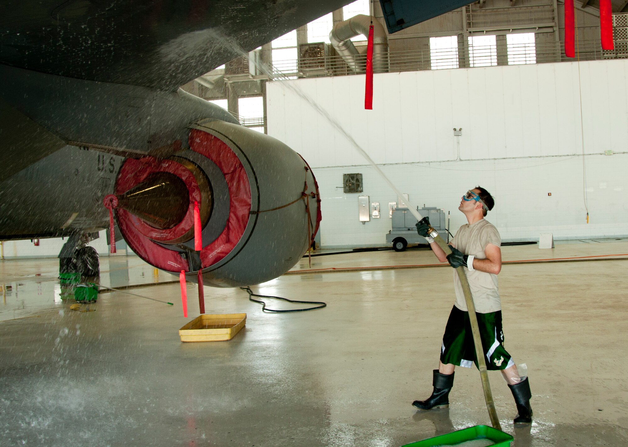 MACDILL AIR FORCE BASE, Fla. – Not many reservists are tasked with caring for antique equipment, but Staff Sgt. Sean Kennedy knows his job is critical to keeping this 53 year-old plane in the fight. Kennedy and others from the 927th Maintenance Squadron, a reserve unit here, participated in an airplane wash and critical corrosion inspection July 14, 2012.  The top-to-bottom wash keeps the plane in pristine condition on the outside.  (Official U.S. Air Force photo/Staff. Sgt. Shawn Rhodes)Rhodes)