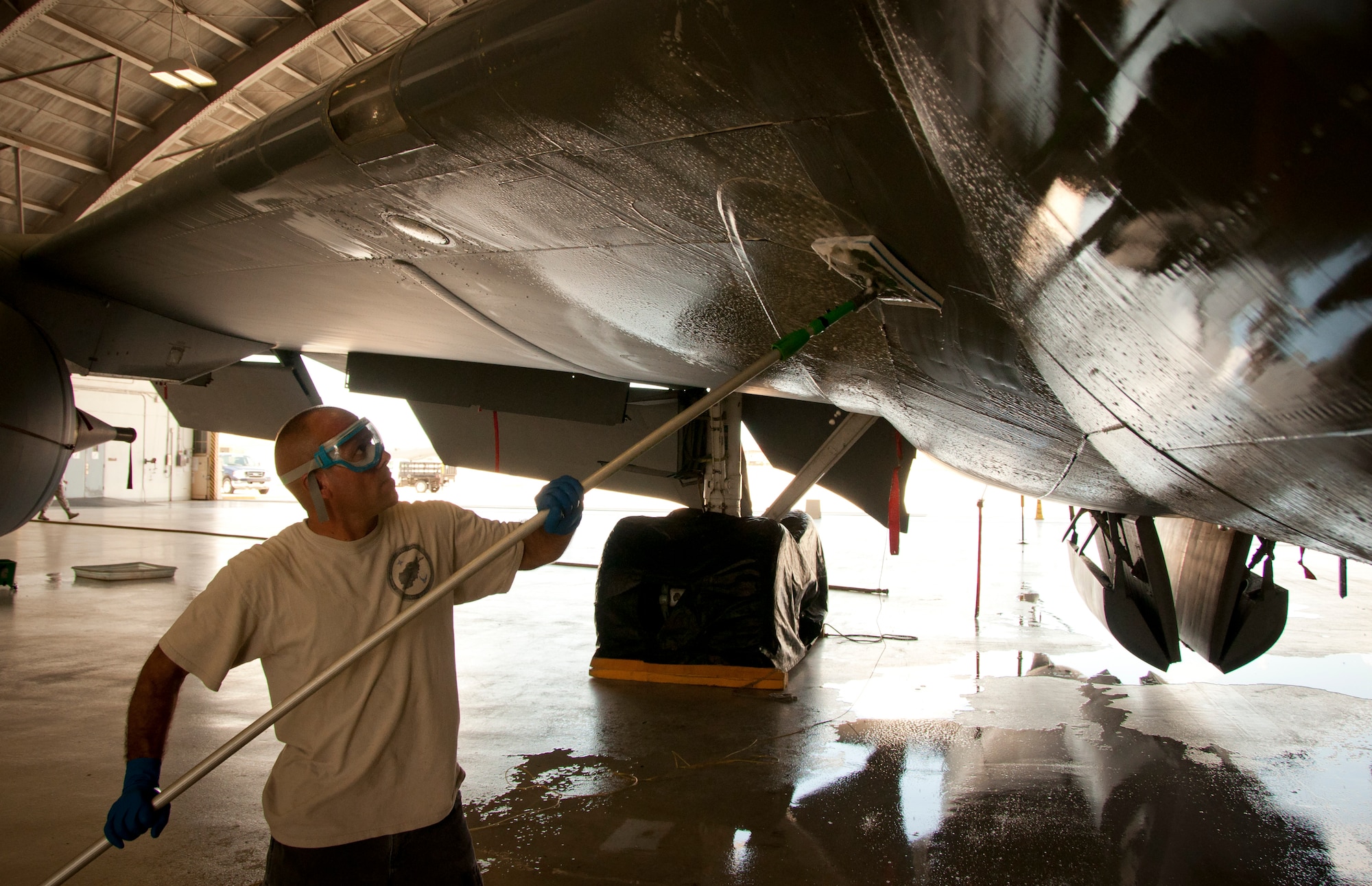 MACDILL AIR FORCE BASE, Fla. – Technical Sgt. Ron Arroyo knows the importance of keeping it clean.  He participated recently in a KC-135 Stratotanker wash and critical corrosion inspection in a hangar here July  14, 2012. The wash is designed to remove the dirt and dust the plane picks up in flight.  Because of the daily efforts of the crew chief and his team with the 927th Maintenance Squadron, 53 year-old airplanes like this still look new.  (Official U.S. Air Force photo/Staff. Sgt. Shawn Rhodes)