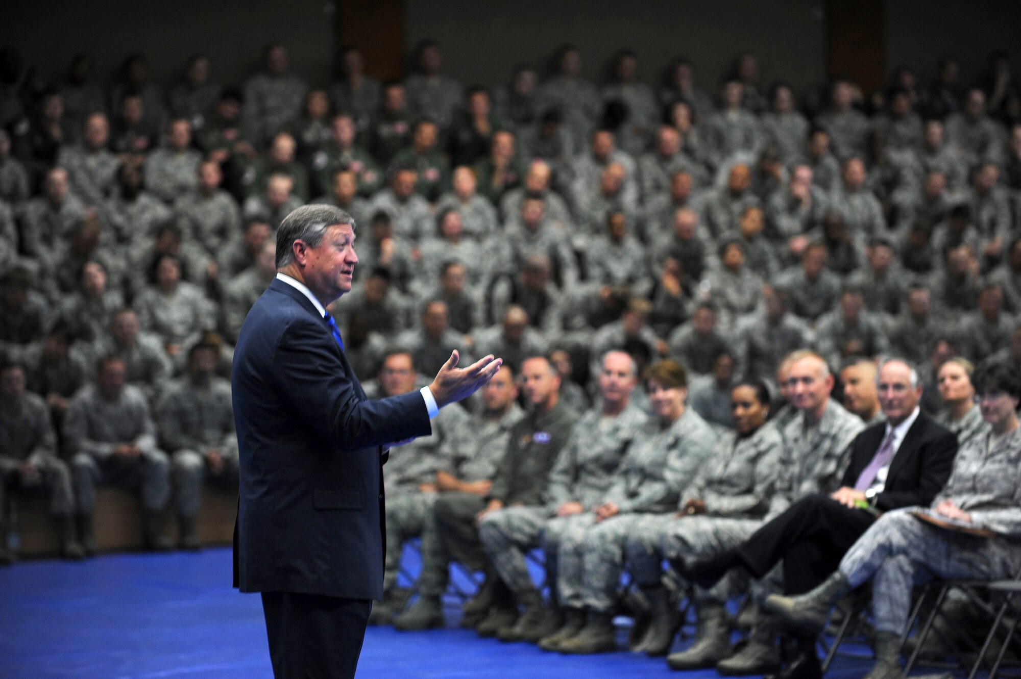 Secretary of the Air Force Michael Donley speaks to 52nd Fighter Wing Airmen during an Airmen’s Call at Spangdahlem Air Base, Germany, on July 13, 2012. During his visit, the secretary learned about the mission of the 52nd FW and the unique capabilities the base provides to the European theater of operations. (U.S. Air Force photo/Senior Airman Matthew B. Fredericks/Released)