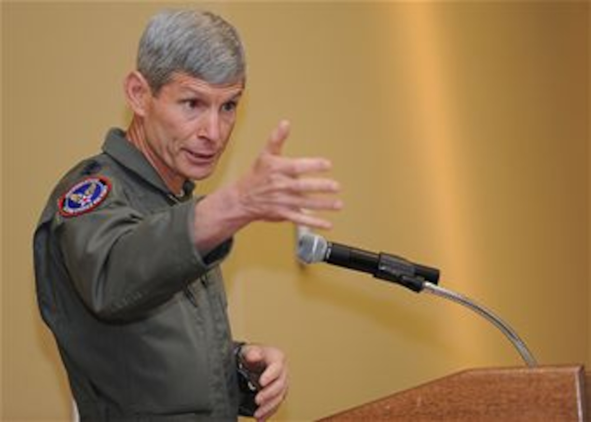 Air Force Chief of Staff Gen. Norton Schwartz speaks to members of the Air Force Association and the Air Commando Association at Hurlburt Field, Fla., July 12, 2012. Schwartz visited the base to meet with Air Force Special Operations Command leaders and airmen. During the visit, he flew his last flight as an active duty officer on an MC-130E Combat Talon I. The MC-130E crew conducted a local training sortie during the mission. It also served as Schwartz's "fini flight" in the Air Force. (U.S. Air Force photo/Airman 1st Class Christopher Williams)