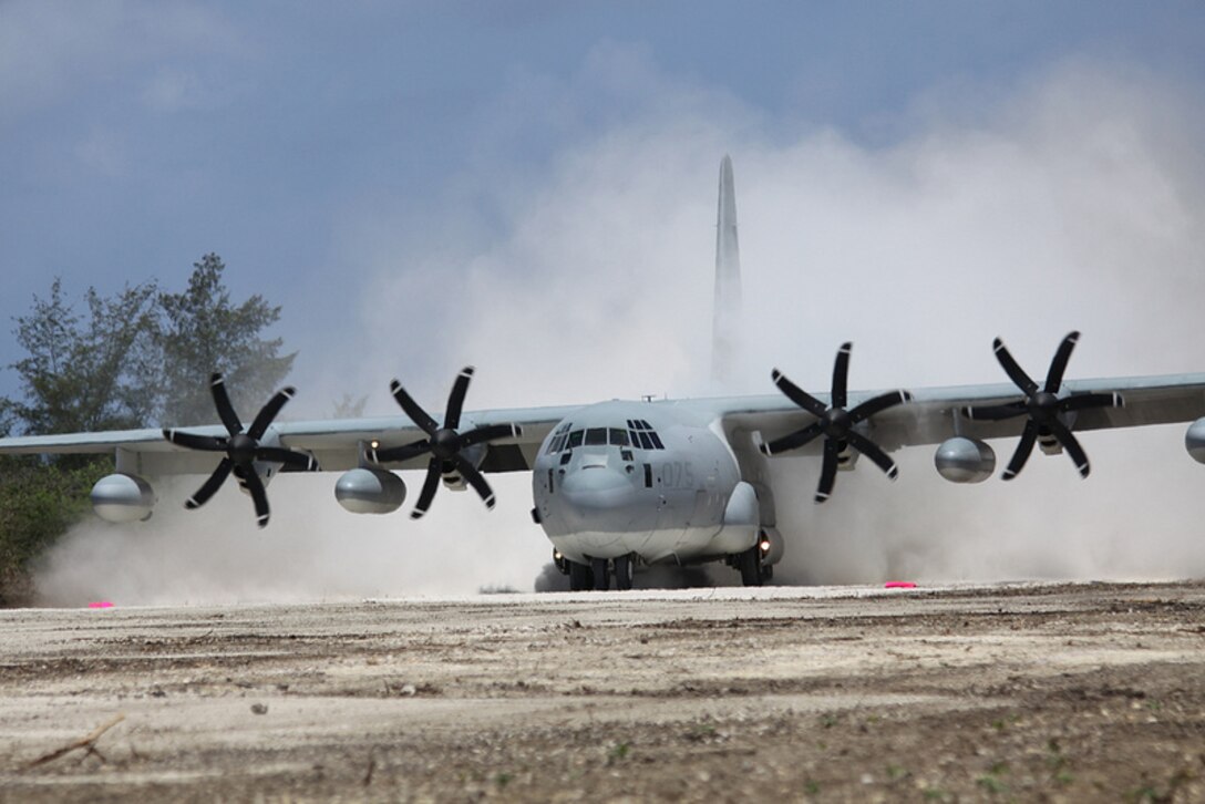 A KC-130J Hercules aircraft lands on Tinian Island's North Field runway, May 30, During Exercise Geiger Fury 2012. The Aircraft was the first to land on the runway since 1947. The runway was cleared and repaired by elements of Marine Wing Support Squadron 171 during Exercise Geiger Fury 2012 which is intended to increase aviation readiness and simulate operations in a deployed austere environment. The aircraft is with Marine Aerial Refueler Transport Squadron 152, Marine Aircraft Group 36, 1st Marine Aircraft Wing, III Marine Expeditionary Force. MWSS-171 is with MAG-12, 1st MAW, III MEF. (USMC Photo by Lance Cpl. Benjamin Pryer/Released)