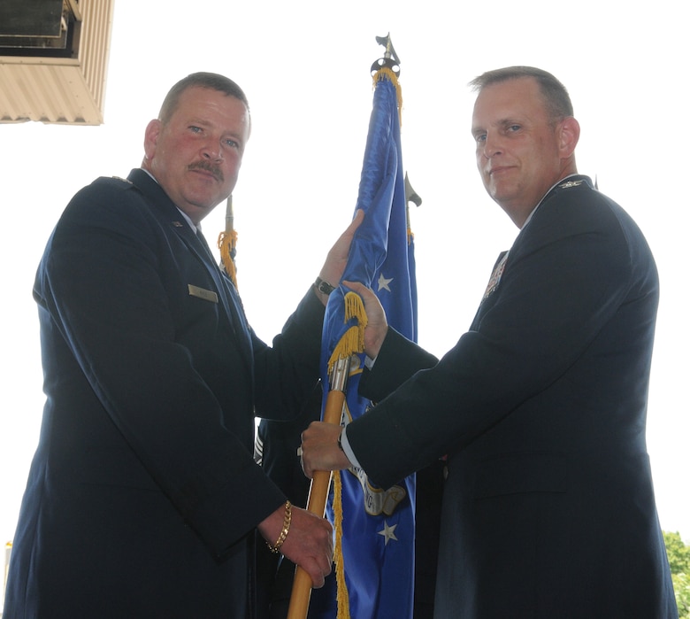 Col. William Mason and Maj. Gen. Mark Kyle, 4th commander, Air Force, pose for a picture as Mason assumes command of the 459th Air Refueling Wing during a change of command ceremony, July 15, 2012. Mason is joining the 459 ARW from the 931st Air Refueling Group at McConnell Air Force Base, Kan. (U.S. Air Force photo/ Senior Airman Katie Spencer)
