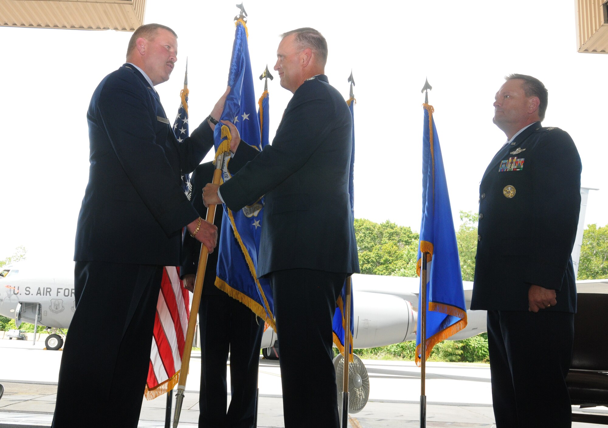 Col. William Mason receives the guidon from Maj. Gen. Mark Kyle, 4th commander, Air Force, and assumes command of the 459th Air Refueling Wing during a change of command ceremony, July 15, 2012. Mason is joining the 459 ARW from the 931st Air Refueling Group at McConnell Air Force Base, Kan. (U.S. Air Force photo/ Senior Airman Katie Spencer)