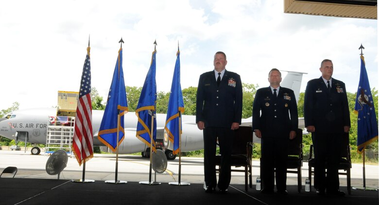 Maj. Gen. Mark Kyle (far left), commander, 4th Air Force , Col. Samuel Mahaney (middle), and Col. William Mason (far right), stand at attention during a change of command ceremony in which Mason assumes command of the 459th Air Refueling Wing, July 15, 2012. Mason is joining the 459 ARW from the 931st Air Refueling Group at McConnell Air Force Base, Kan. (U.S. Air Force photo/ Senior Airman Katie Spencer)