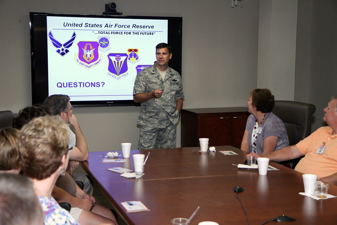 Col. Albert V. Lupenski, commander of the  932nd Airlift Wing, briefs civilian employers about the Air Force Reserve mission at the annual Boss Day activities.  Employers of traditional reservists were able to get a close-up look at what occurs during a weekend monthly drill at the 932nd AW.   Boss Day is supported by The Employer Support of the Guard and Reserve program (ESGR).  The 932nd AW is only Air Force Reserve unit that flies the C-40C.  (U.S. Air Force photo/Tech. Sgt. Christopher Parr)  
