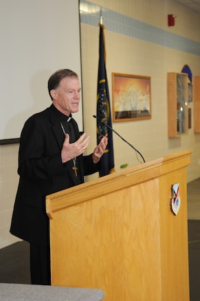 Bishop John Wester of the Utah Catholic Diocese speaks at the 4th annual interfaith devotional at the Utah Air National Guard Base in Salt Lake City, July 15, 2012. (U.S. Air Force Photo by MSgt. Gary Rihn/Released)