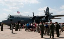 A Minnesota Air National Guard C-130 “Hercules” brings home about thirty Airmen from deployment to Southwest Asia on July 13, 2012 to the St. Paul Air Guard base, greeted by enthusiastic family and friends. Two more C-130 flights are scheduled over the next couple of days, each with about another thirty Airmen aboard, redeploying back to the 133rd Airlift Wing. USAF official photo by Tech. Sgt. Erik Gudmundson