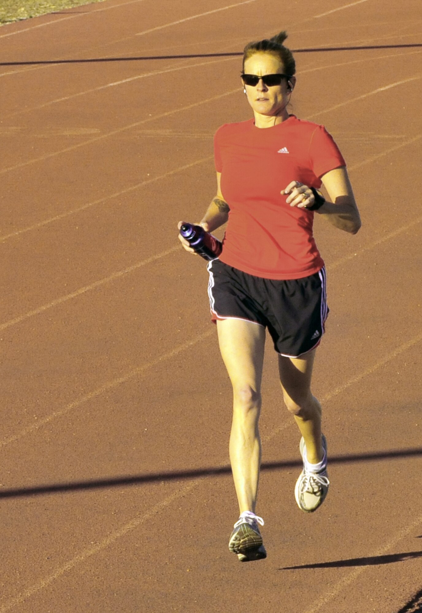 Senior Master Sgt. Erin Buchanan, 44th Operations Support Squadron Aircrew Flight Equipment superintendent, runs 2.5 to 8 miles every day in preparation for the 16th Annual Air Force Marathon. Buchanan recently completed a half marathon at Holloman Air Force Base, N.M., with the fastest military female time 2:04:51 and received an invitation to the Air Force Marathon at Wright-Patterson Air Force Base, Ohio, scheduled for September 15. (U.S. Air Force photo/SrA Martha Whipple)