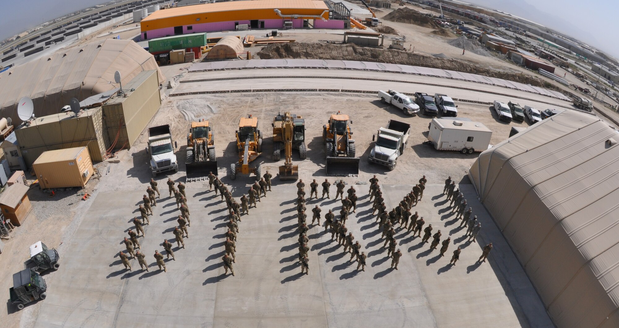 Members of the 577th Expeditionary Prime Beef Squadron spell the name "Dyrk" to contribute to the hometown "Dyrkstrong" effort. Four-year-old Dyrk Burcie was diagnosed with terminal cancer, and his father's fire department co-workers began an effort to bring as many smiles to the faces of Dyrk's family as possible. Lt. Col. Michael Nester, 577 EPBS commander, is a cousin of Dyrk's Dallas-Fort Worth, Texas, family. (U.S. Air Force photo/TSgt Shawn David McCowan)